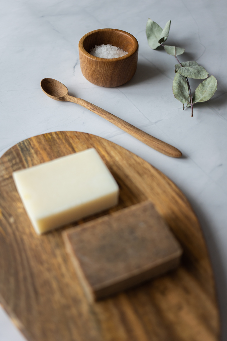 Fresh fragrant handmade soap on timber board